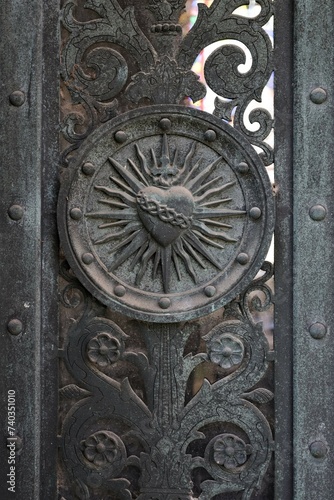 close up ancient weathered wrought metal  ornaments 