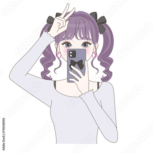 スマホで自撮りする女の子