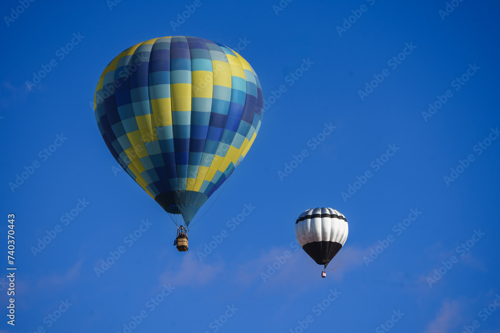 Naklejka premium hot air balloons floating over southern Utah desert