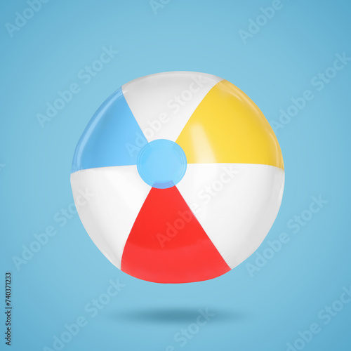 One beach ball in air on light blue background