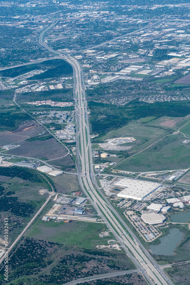 Aerial view of warehouses in Austin Texas along Route 290 featuring ...