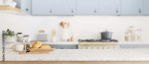 A copy space for display your product on a kitchen tabletop in a cozy minimal kitchen.