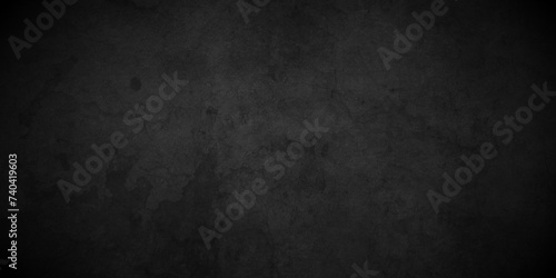 Distressed Rough black old charcoal wall slate texture wall grunge backdrop rough background, dark blue concrete blank grunge background. black concrete wall , grunge stone texture background. © MdLothfor
