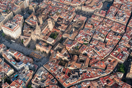 Aerial high angle view of Barcelona old town buildings, Spain. Late afternoon light