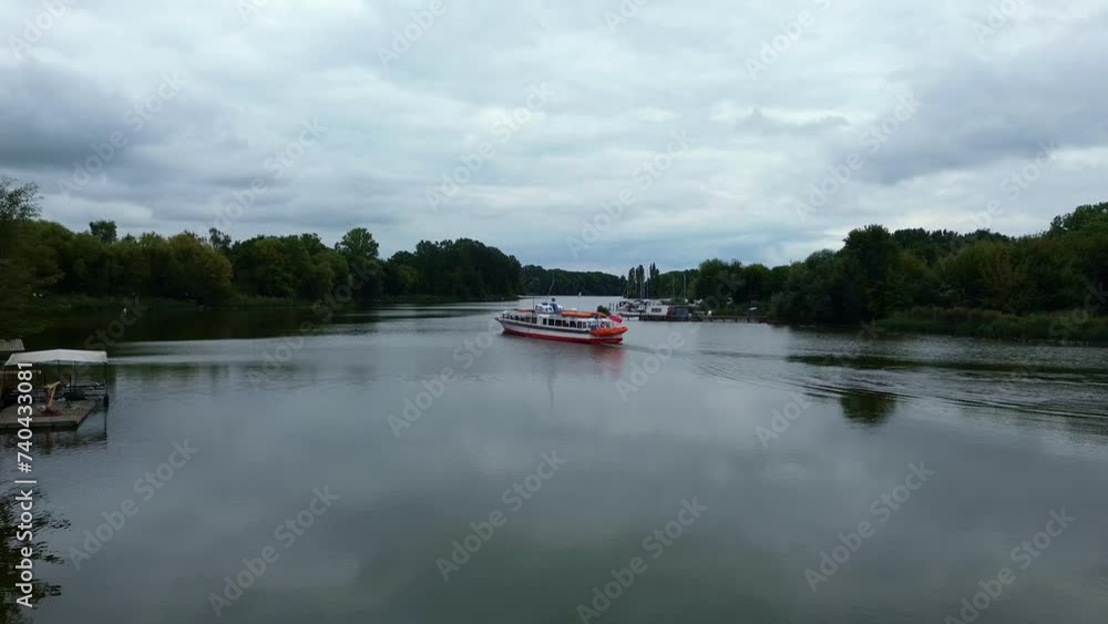 aerial view track boat sailing on the lake on cloudy day in poland aerial view track boat sailing on the lake on cloudy day in poland