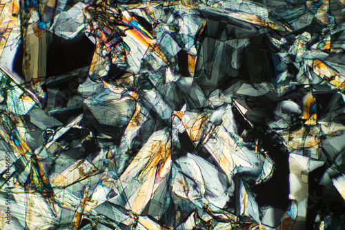 Abstract micrograph of methionine crystals made with a polarizing microscope.