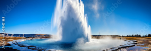 The Majestic Show of Power and Beauty: A Lone Geyser Erupting into the Clear Blue Sky