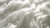 Texture of wispy silver strands catching the light and appearing to shimmer in a soft otherworldly way.