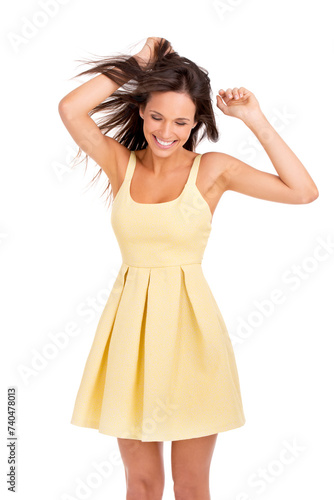 Woman, dancing and energy with joy from music, fashion and party with confidence in a studio. Happy, funny and freedom with trendy clothes and dress with white background and crazy fun with a smile © Y.A./peopleimages.com