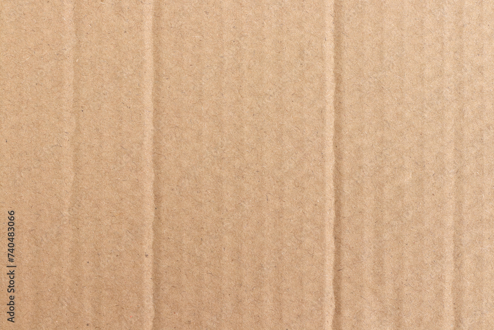 Fototapeta premium Brown cardboard sheet abstract background, texture of recycle paper box in old vintage pattern for design art work.
