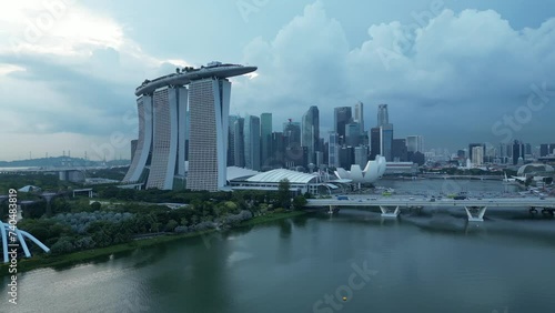 Aerial shot of Singapore’s Marina Bay Sands Area. Shot just off the Promenade and Marina Bay Street Formula One 1 Circuit. Establishing drone tracking pull away shot Tourism Singapore photo