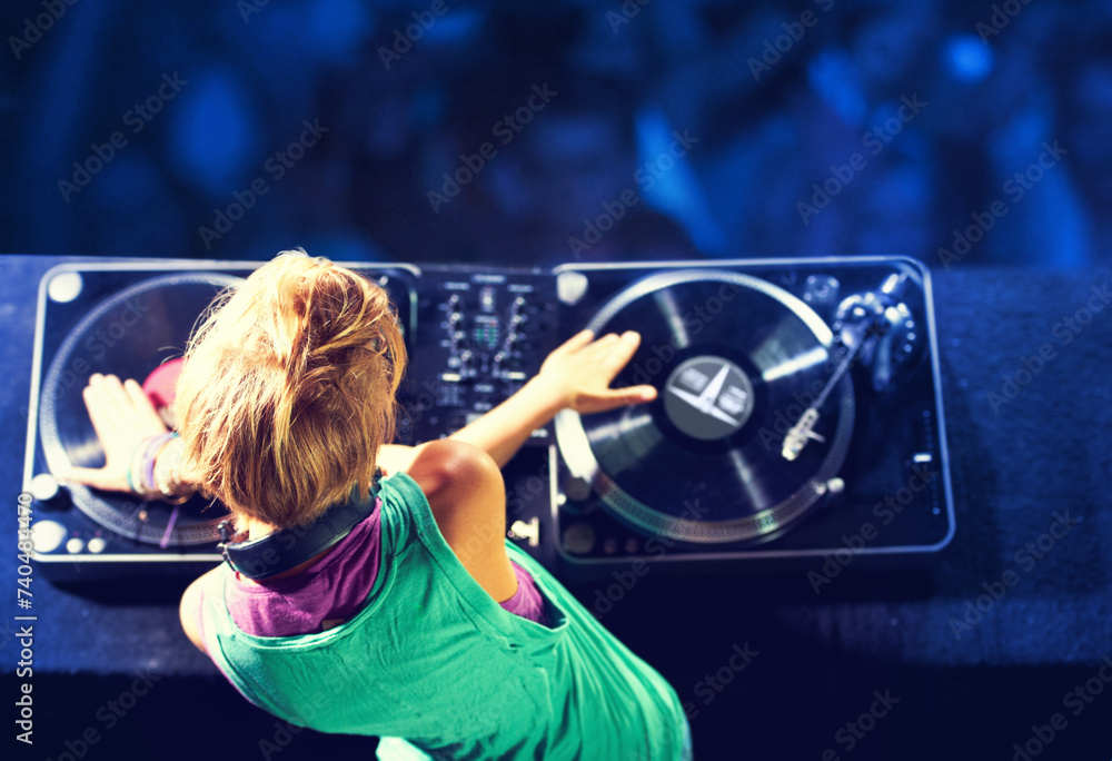 Person, hands and turntable for nightclub performance for celebration dance party for listen, entertainment or event. Dj, headphones and techno in Florida for new year crowd, audience or electronic Person, hands and turntable for nightclub performance for celebration dance party for listen, entertainment or event. Dj, headphones and techno in Florida for new year crowd, audience or electronic