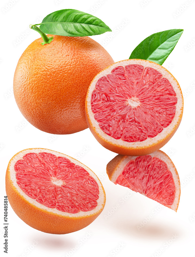 Red grapefruit and grapefruit slices levitating in air on white background. File contains clipping paths. Red grapefruit and grapefruit slices levitating in air on white background. File contains clipping paths.