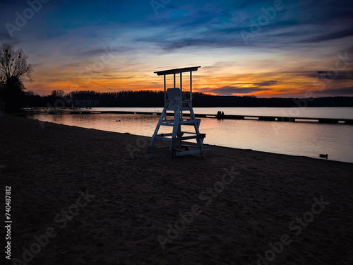 Obraz na płótnie Sunset on the beach. Olsztyn. Lake Ukiel w salonie