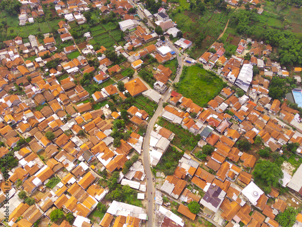 Aerial view of Highly Populated Area in Bandung City, capital of West Java Province, Indonesia. One of the most densely populated residential districts in Asia.Shot from a drone flying 200 meters high