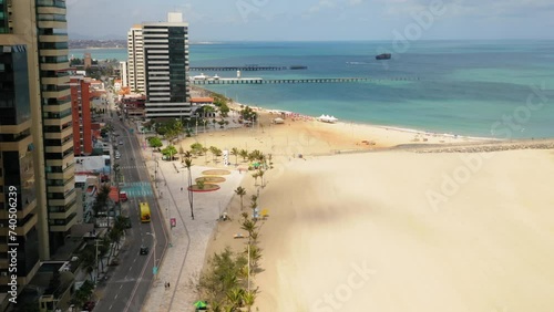 Aerial view of the buldings in front of the sea, the avenue and the empty beach in a cloudy day, Fortaleza, Ceara, Brazil photo