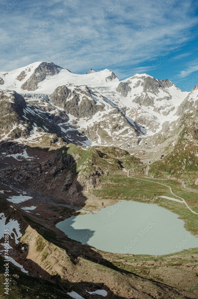 Heart shaped lake at Sustenpass in the swiss mountains