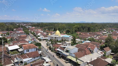 Drones above the village surround the mosque in the center of the village photo