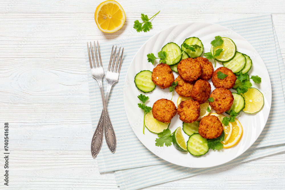 fried rice cutlets, rice tikki on white plate fried rice cutlets, rice tikki on white plate