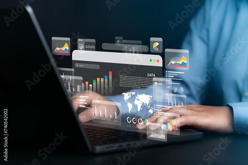 Businessman analyzing data using computer with graph dashboard for data business analysis. Data management with KPI, connectivity, operations, sales, marketing of databases for technology finance.