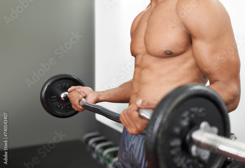 Man, shirtless and arm weightlifting for workout as bodybuilder for exercise strength, fitness or muscle. Person, athlete and topless with curl bar in Miami for health training, performance or gym