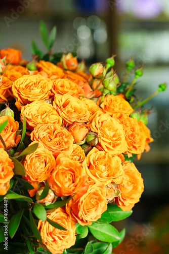 Bouquet of Orange Roses on Table