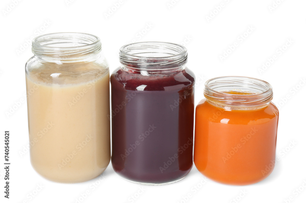Baby food. Different healthy puree in jars isolated on white Baby food. Different healthy puree in jars isolated on white