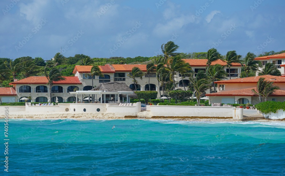 landscape of tropical beach and house in Caribbean ocean