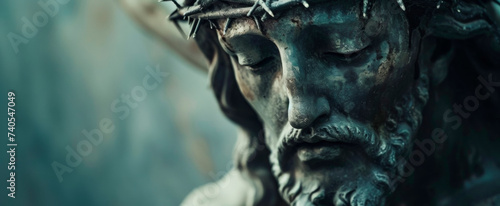 Close-up of a Jesus Christ statue with a crown of thorns, conveying sorrow and sacrifice with a serene expression Ideal for religious themes, banner format with ample copy space photo