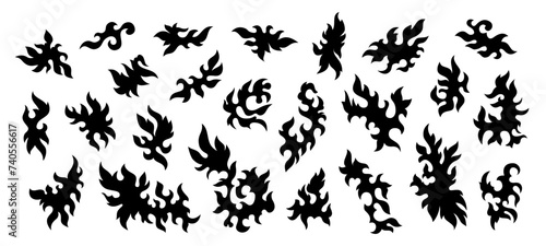Set of silhouettes of leaves, botanical elements. Vector graphics. Collection of black silhouettes leaves. Vector elements isolated on white background. Tattoo art. Black and white illustration. © Andrey
