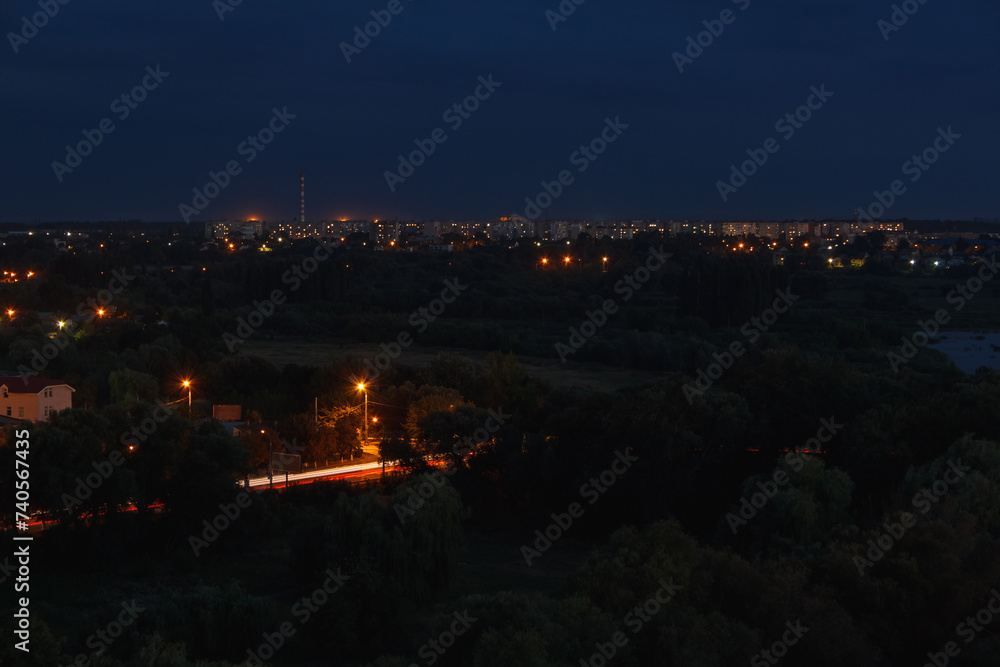 Evening city. View from the roof of a multistory building. Ukraine