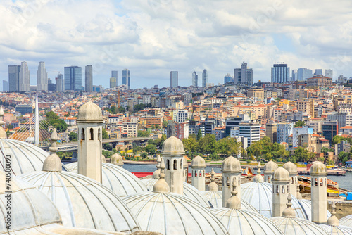 Panoramic view of Istanbul's skyline from the Suleymaniye Mosque. Commissioned by Suleiman the Magnificent in the 1500s, this grand mosque is a masterpiece of Ottoman architecture in Turkey. photo