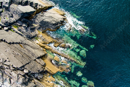 Rough and rocky shore along famous Ring of Kerry route. Rugged coast of on Iveragh Peninsula, Ireland. photo