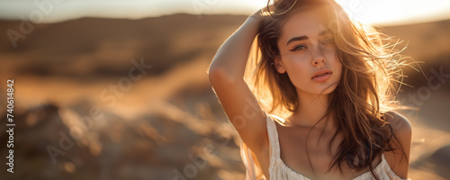 Cosmetic beauty and fashion banner with close-up portrait of a young beautiful woman outdoors in nature with copy space