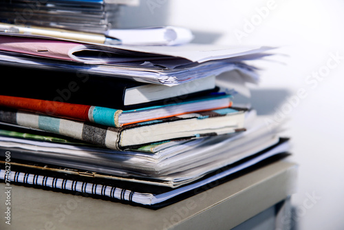 stack of documents in library