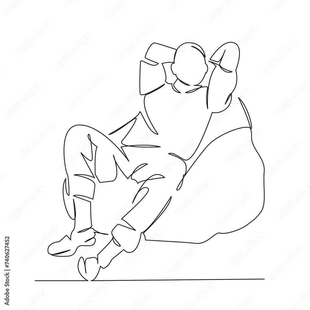 guy sitting on a bag