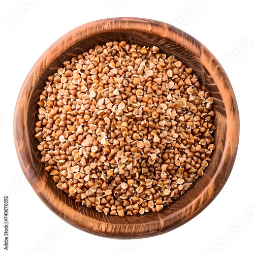 Closeup of brown buckwheat grain in bowl top view isolated on white background