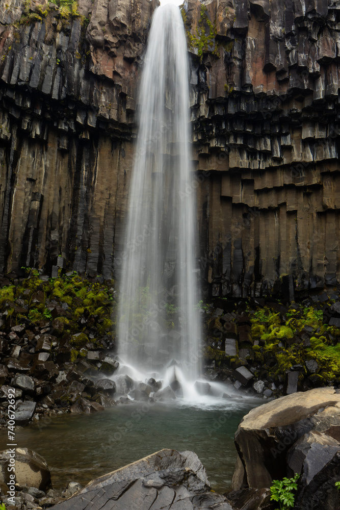 Majestic basalt column waterfall in Iceland Majestic basalt column waterfall in Iceland