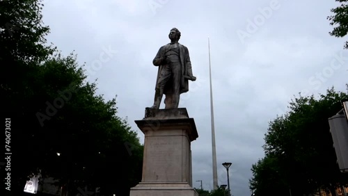 O'Connell Monument and The Spire in background in Dublin, Ireland photo