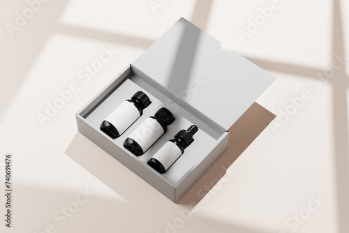 travel kit mockup for cosmetics, including a box, two bottles and a dropper bottle
