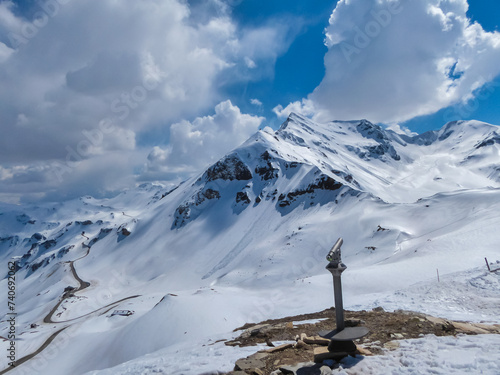 Grossglockner high alpine road going along majestic snow covered mountain peaks in High Tauern National Park, Carinthia Salzburg, Austria. Remote high altitude landscape in Austrian Alps. Nature lover