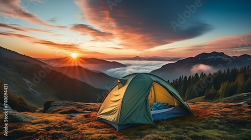 Camping tent high in the mountains. tourist tent camping in mountains at sunset