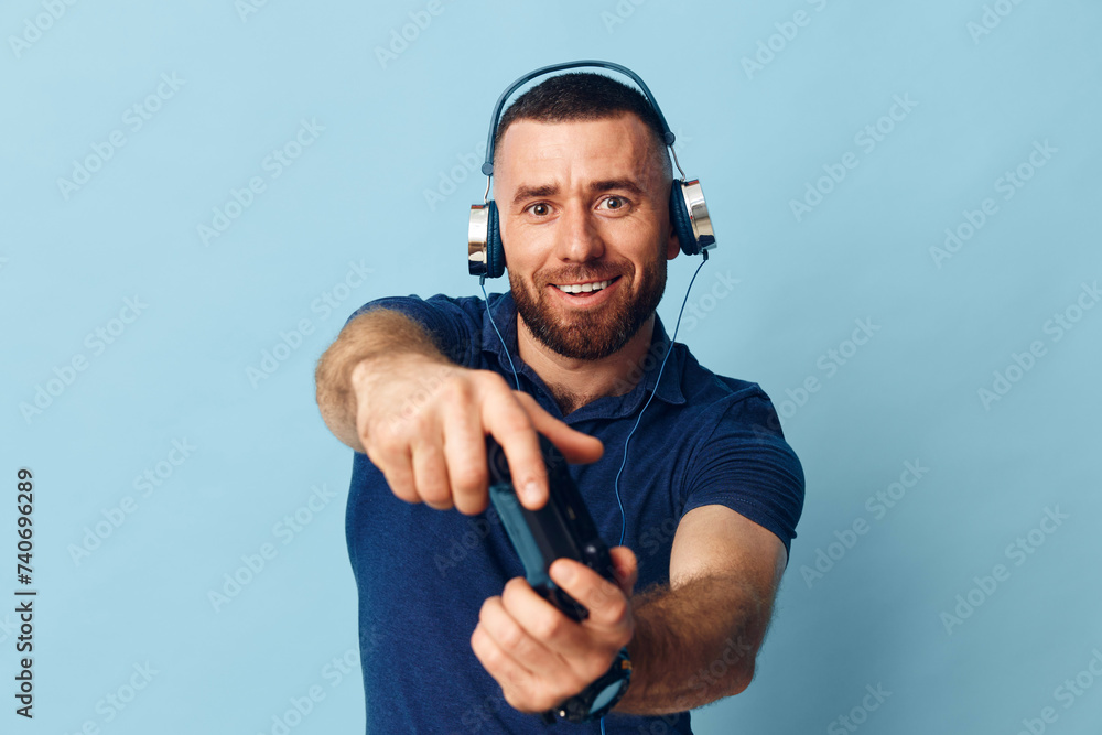 Fototapeta premium Guy background portrait technology earphones music young listen men happy adult sound men person