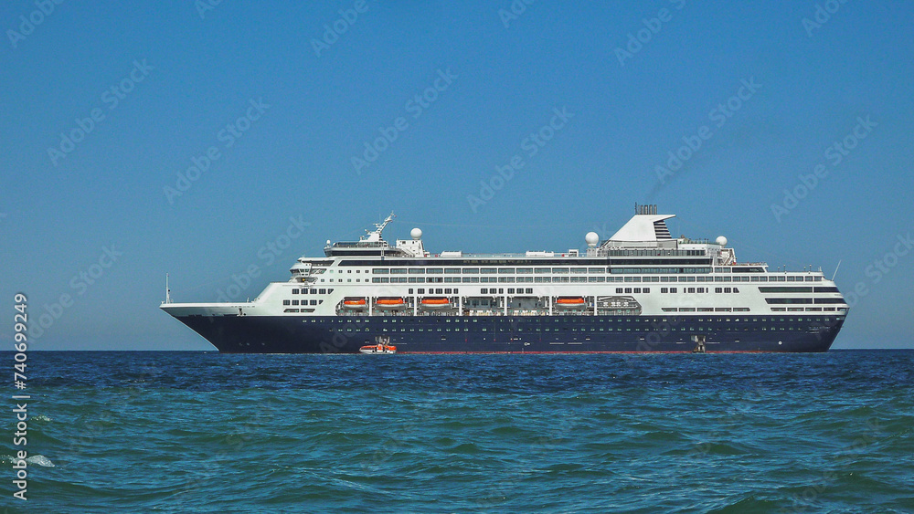 Classic cruiseship cruise ship liner Ryndam at sea anchoring or in port