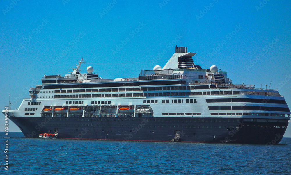 Classic cruiseship cruise ship liner Ryndam at sea anchoring or in port