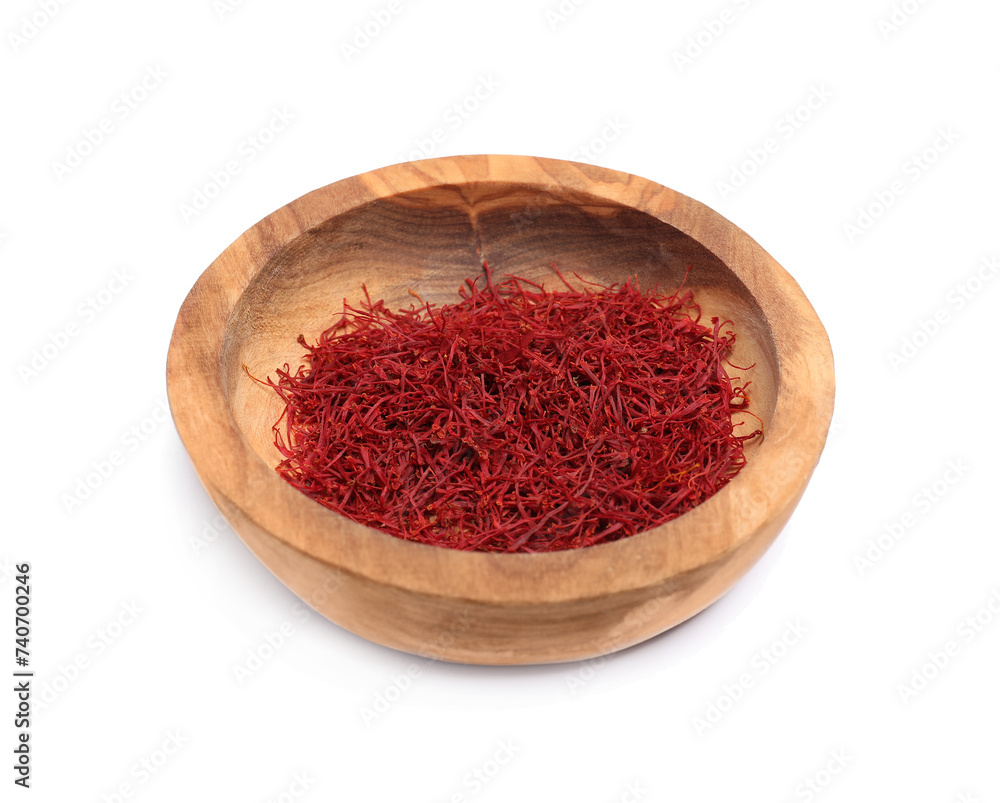 Aromatic saffron in bowl isolated on white Aromatic saffron in bowl isolated on white