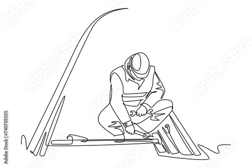 single one line drawing of rail workers adjust wrench. all about station and train activity. Simple line, train activity.