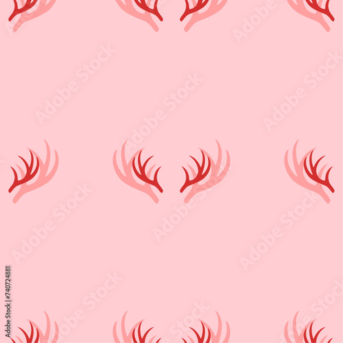 Seamless pattern of large isolated red deer horns symbols. The elements are evenly spaced. Vector illustration on light red background