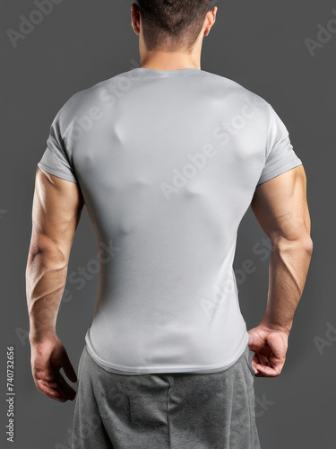 mock-up of a t-shirt, blank template of a shirt, man wearing a gray shirt © Alessandro