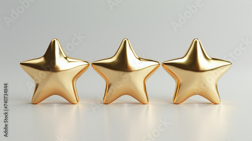 Three gold stars on a gray background. Isolated.